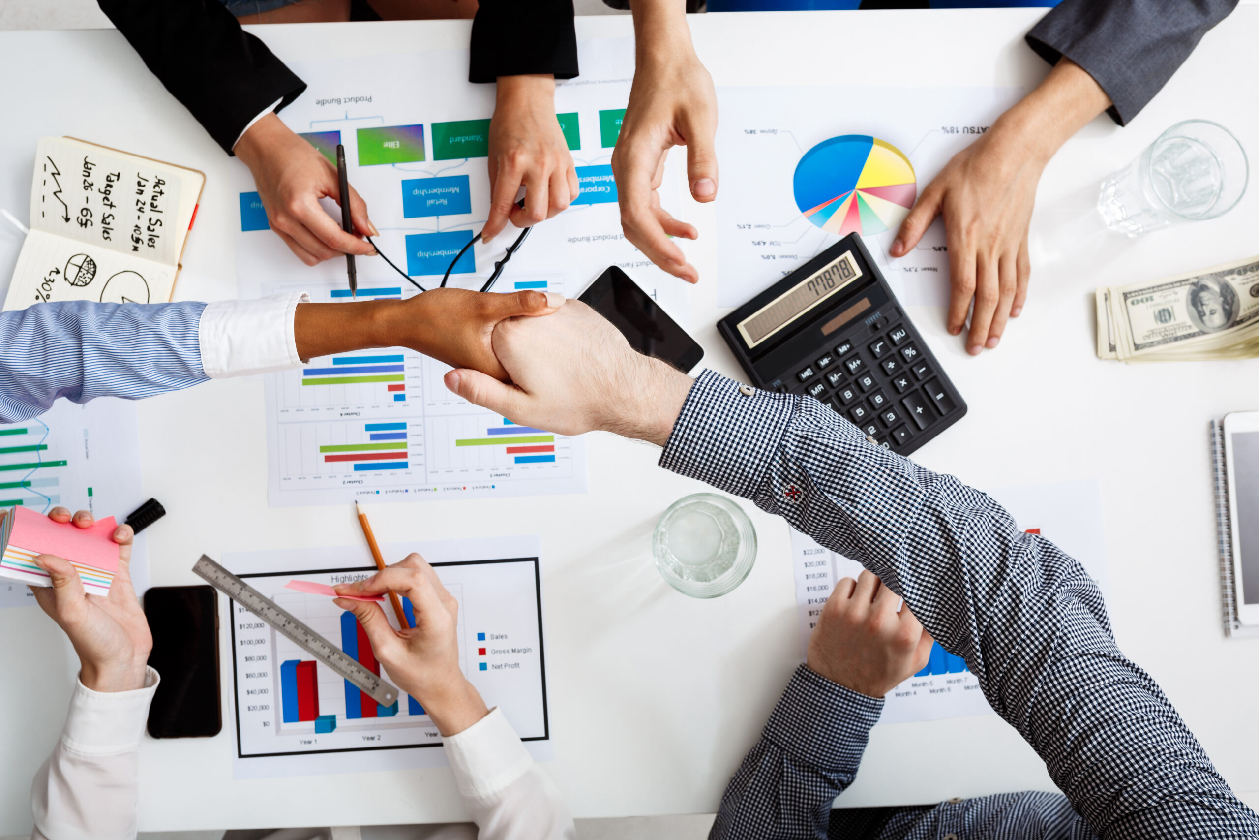 Procurement team managing manual PR GRN processes with paper documents and three-way matching for F&B operations